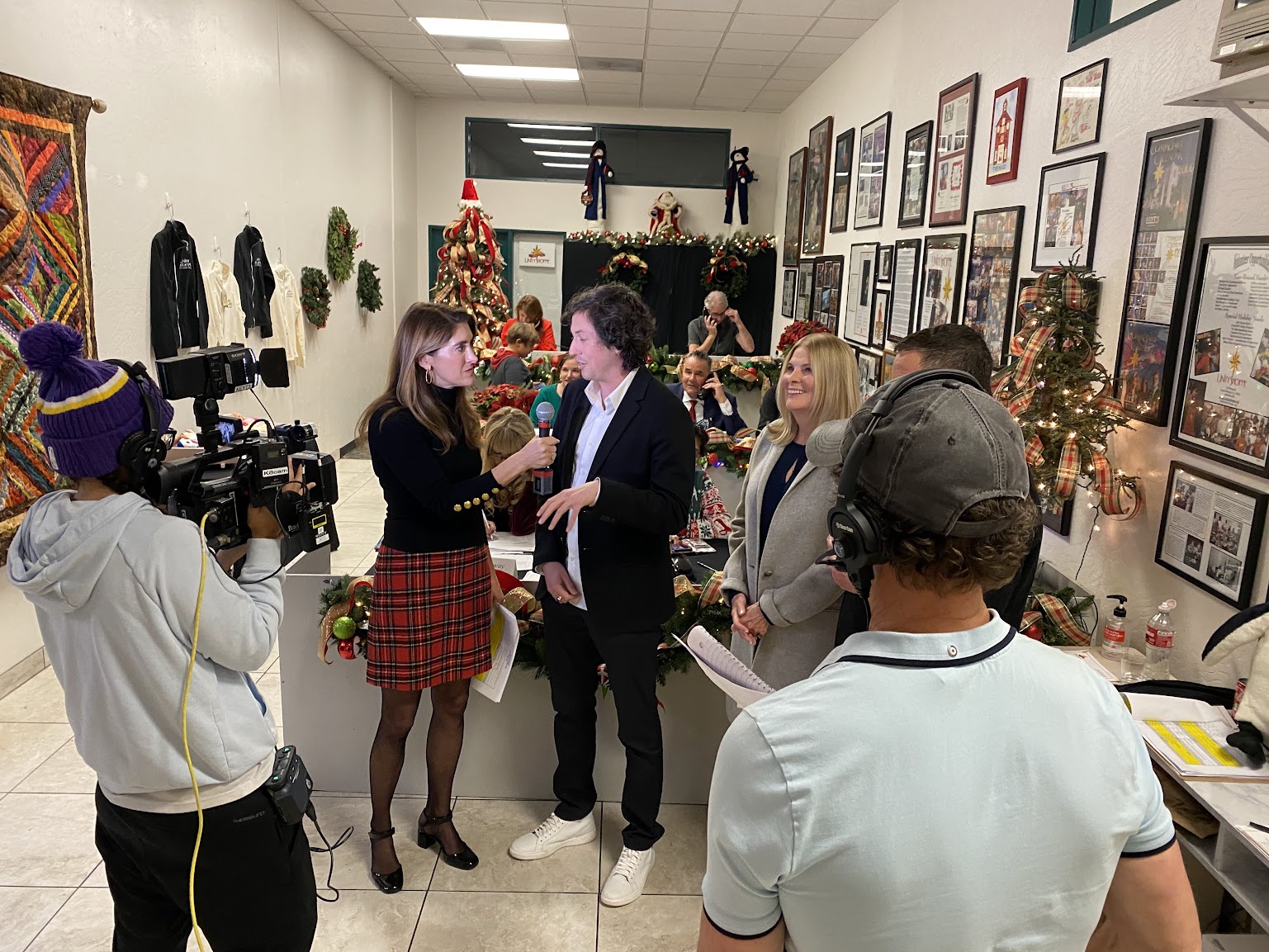 tv host interviewing a telethon guest